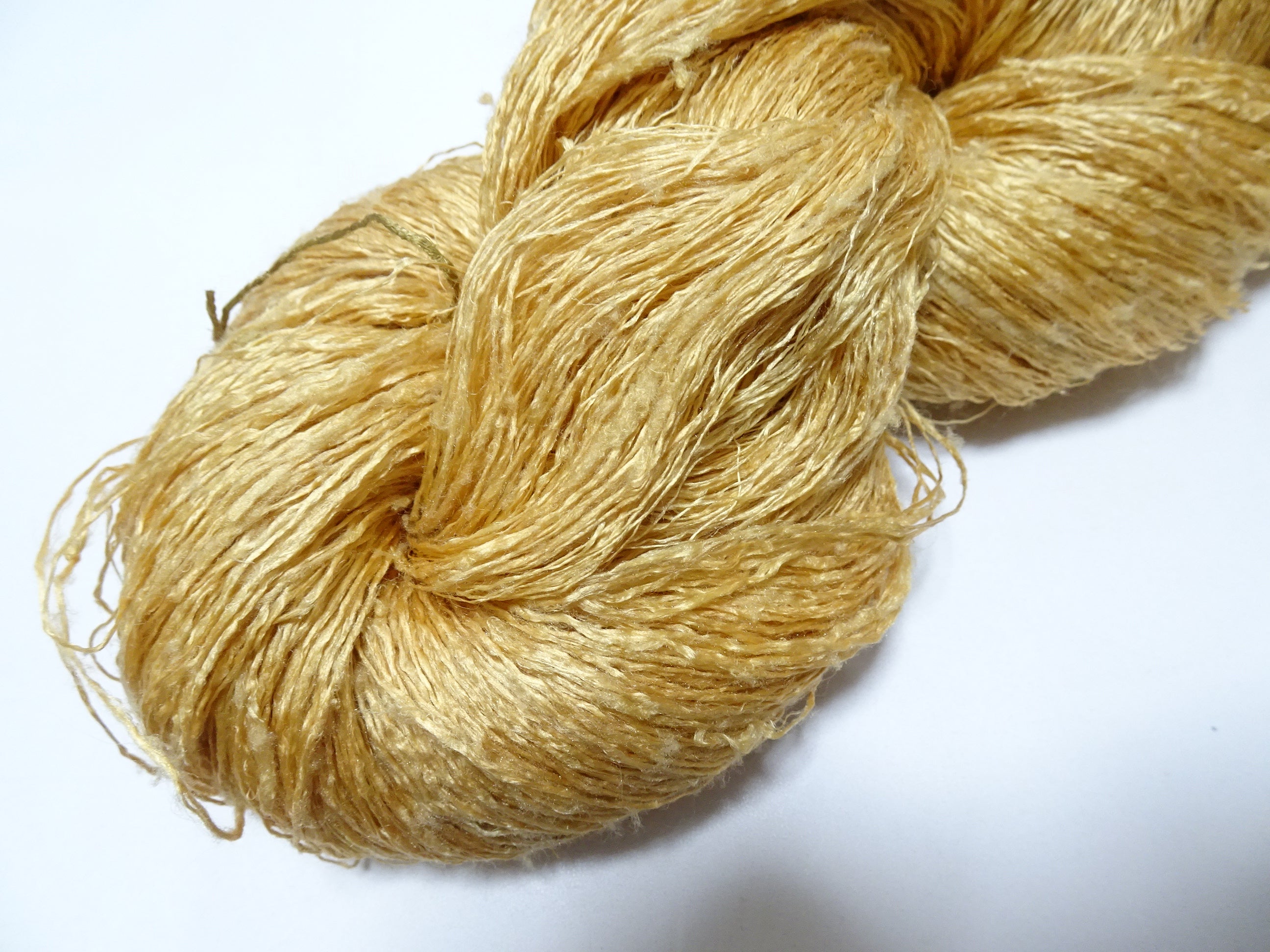 What is Tsumugi silk thread?
