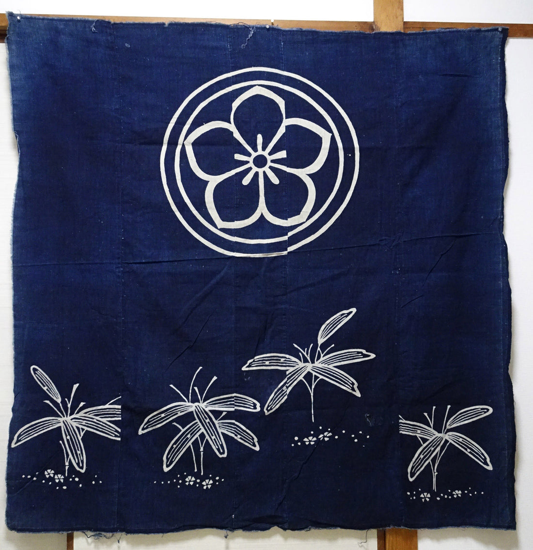 Japanese Antique Tsutsugaki Indigo-Dyed Boro Cloth with Floral Family Crest and Grass Motifs 14016