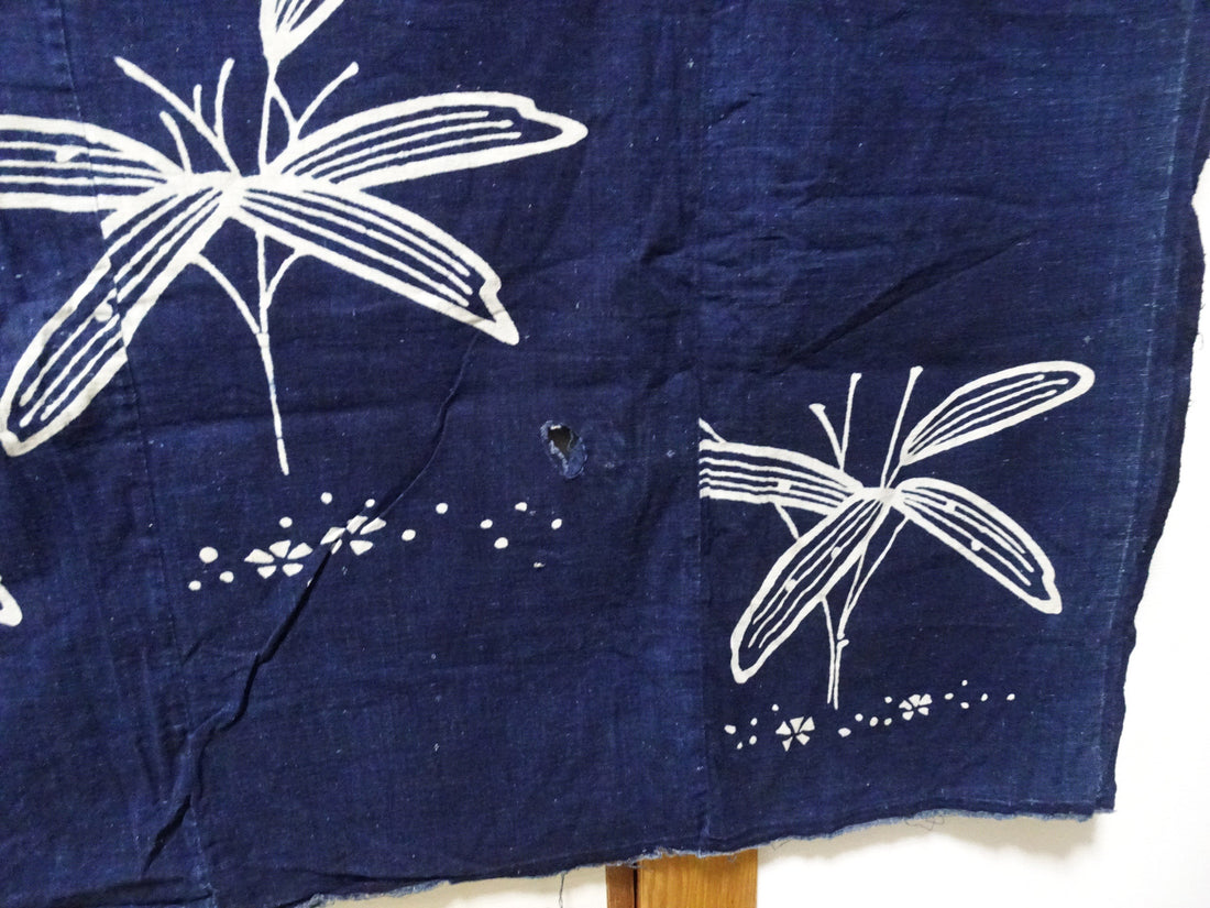 Japanese Antique Tsutsugaki Indigo-Dyed Boro Cloth with Floral Family Crest and Grass Motifs 14016